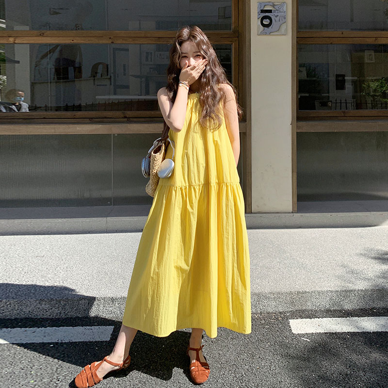 黄色无袖挂脖连衣裙女2025夏季新款法式漂亮宽松气质度假风长裙潮