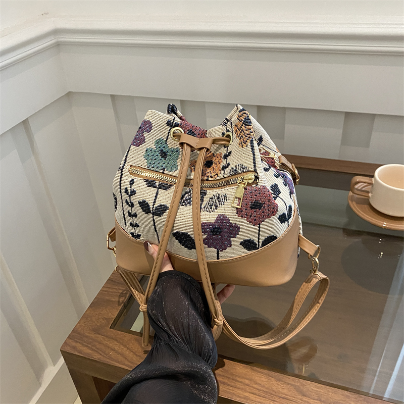 民族风腋下水桶包简约时尚