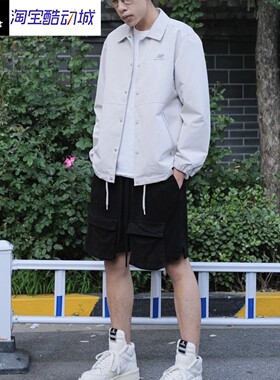 New Balance 纯色Logo梭织翻领教练夹克男女同款5AC39503-LBE