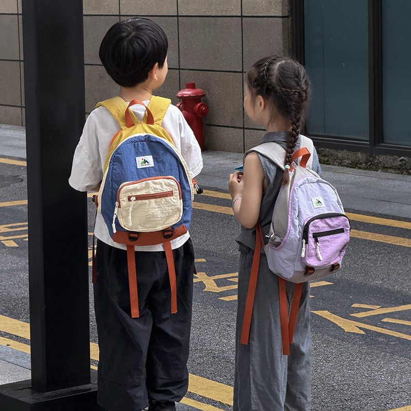 新款幼儿园小学生书包韩版包包时尚拼色男女童双肩包儿童背包潮包