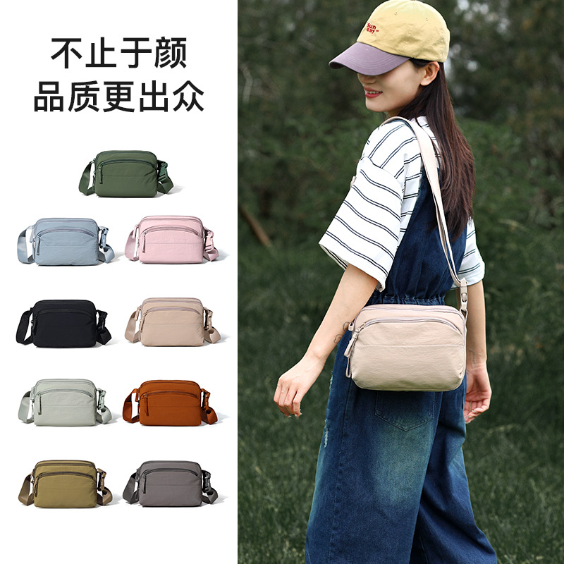 新款韩版纯色简约防水斜挎包多层收纳小方包男包出行轻便小布包潮