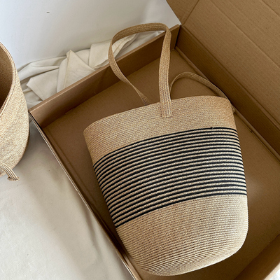 25年新款草编包水桶帽小众设计师款休闲单肩包条纹编织包洋气时髦