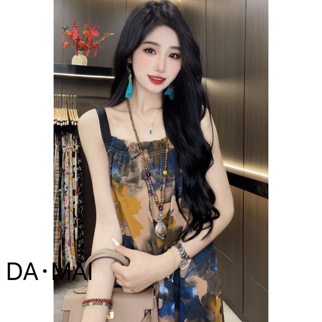 轻奢连衣裙宽松印花2025女款夏季缎料无袖气质时尚吊带背心中长裙