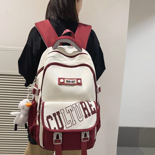 法国DUDK官方护脊减负书包大容量轻便初高中大学生旅行旅游双肩包