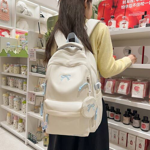法国DUDK高颜值蝴蝶结刺绣双肩包女新款大容量减负书包旅行背包潮
