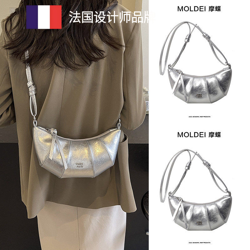 法国MK NB专柜正品 轻奢小包包女2026新款银色牛角包百搭斜挎包潮