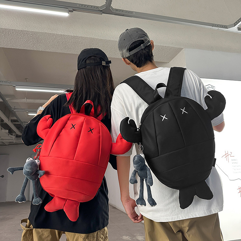 轻奢恐龙创意怪兽背包卡通双肩包双肩背包