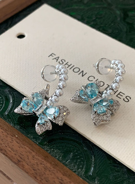 蓝色蝴蝶结耳钉2025新款爆款高级感珍珠耳环女轻奢小清新满钻耳饰