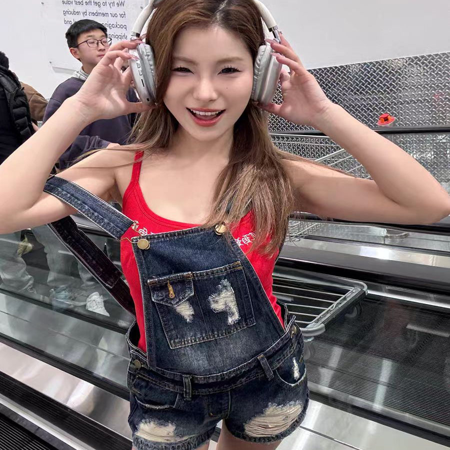 美式千禧辣妹复古做旧水洗磨破牛仔背带裤女春夏包臀修身显瘦短裤