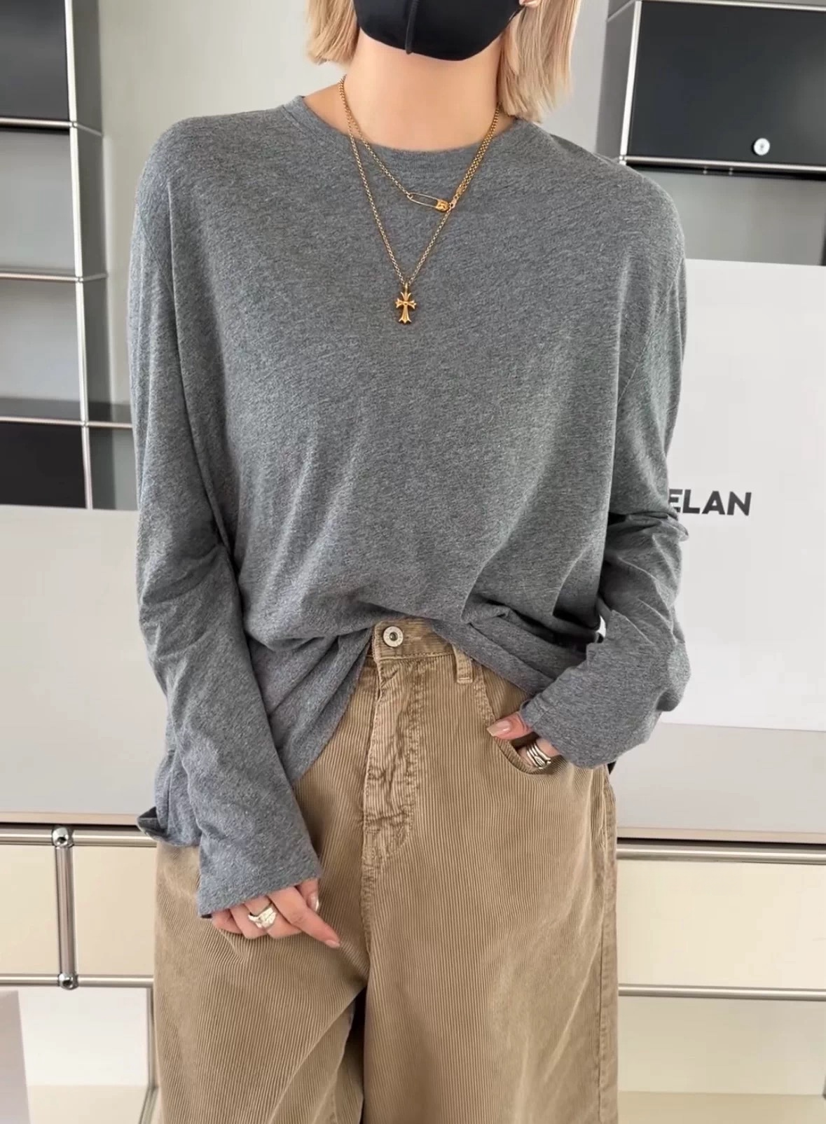 诗歌兰女装26秋款 58802简约慵懒温柔风不规则圆领长袖面膜衣T恤
