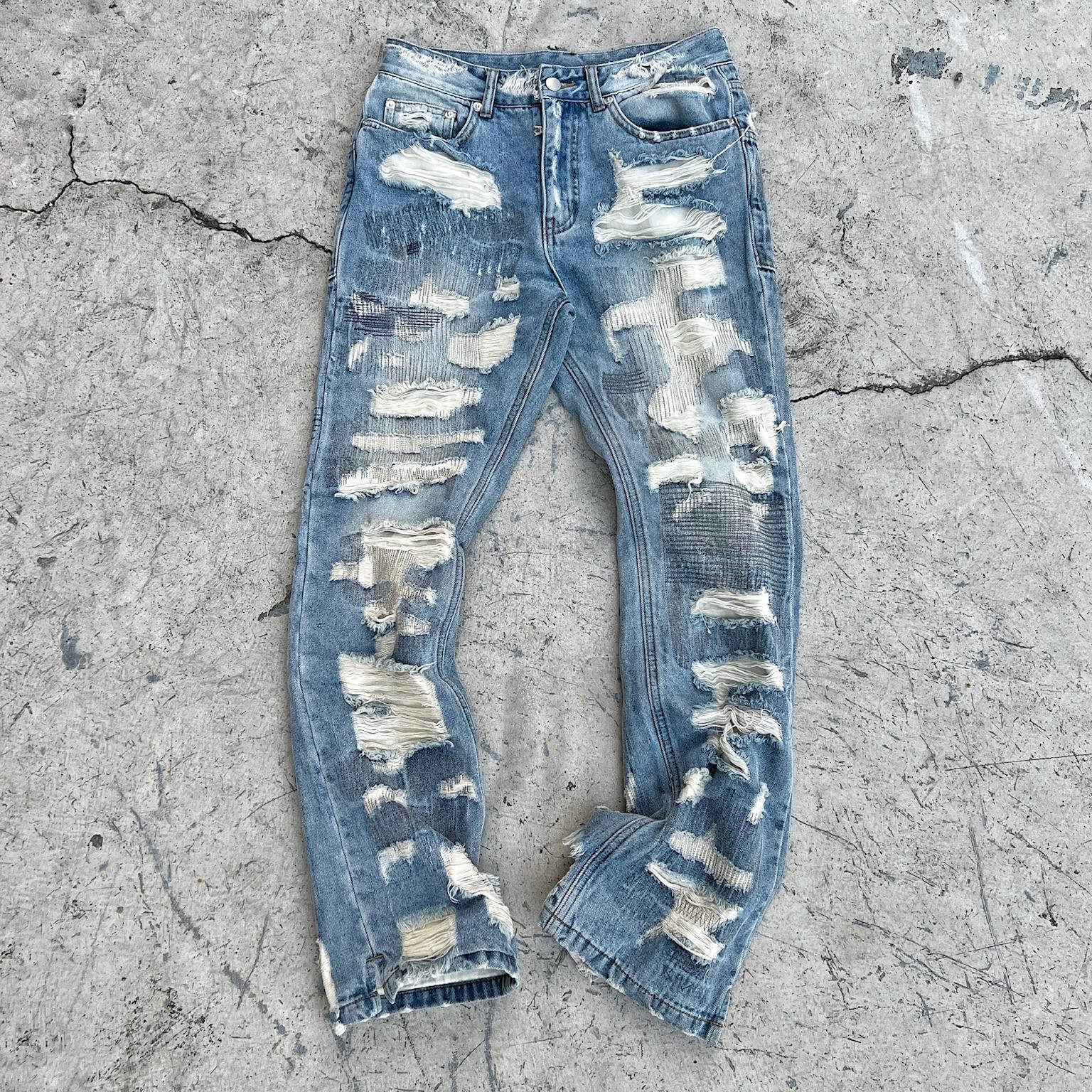 琨感知破洞破坏黑色牛仔裤