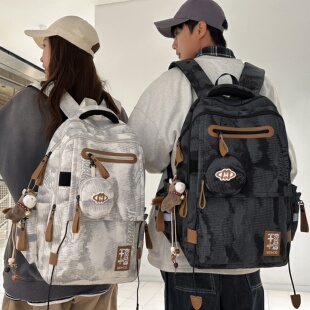 2026新款 护脊减负书包男初中高中生大容量轻便大学生旅行双肩包女