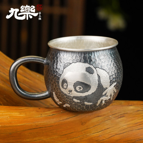 足银999熊猫锤纹把手杯