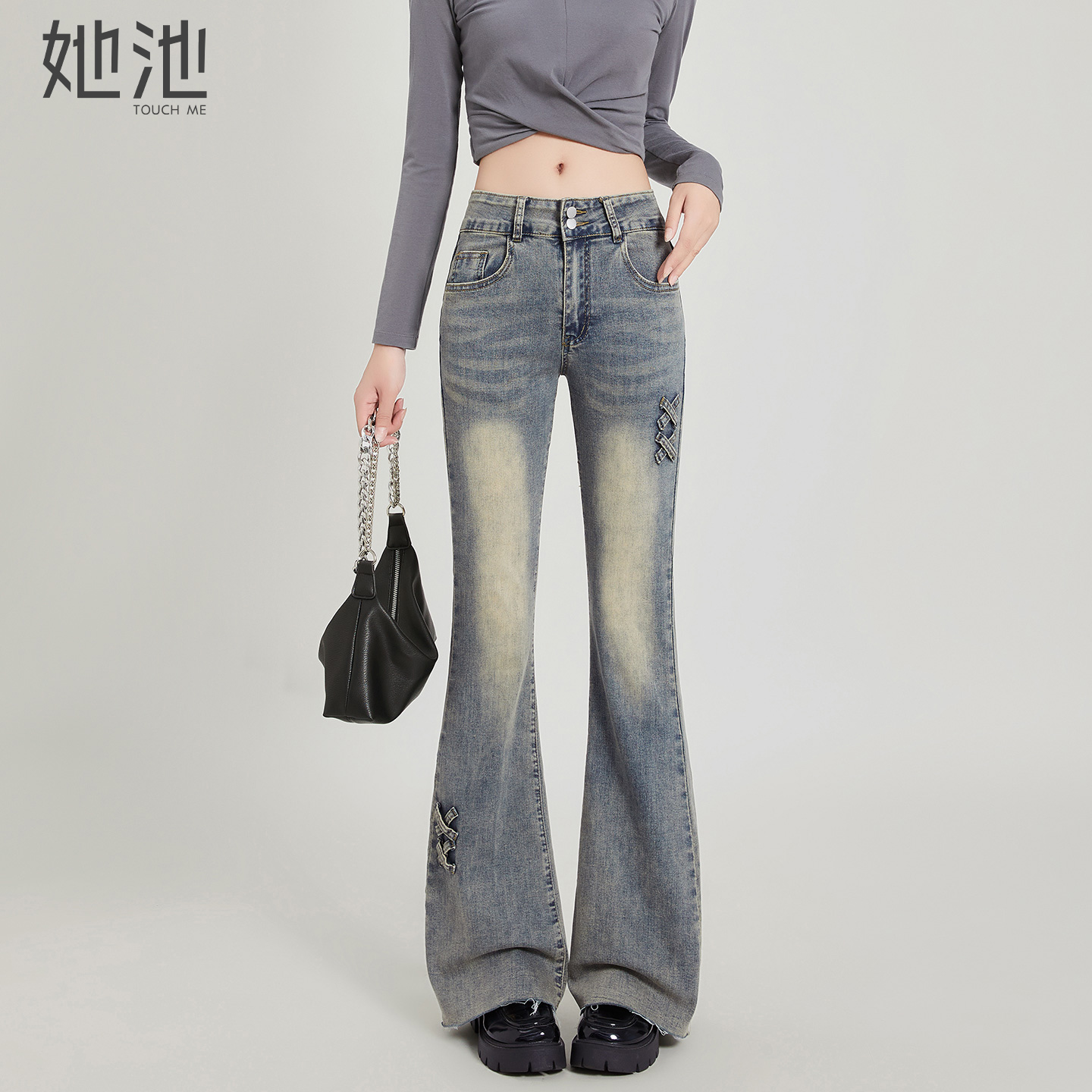 她池修身微喇绑带长款水洗牛仔裤