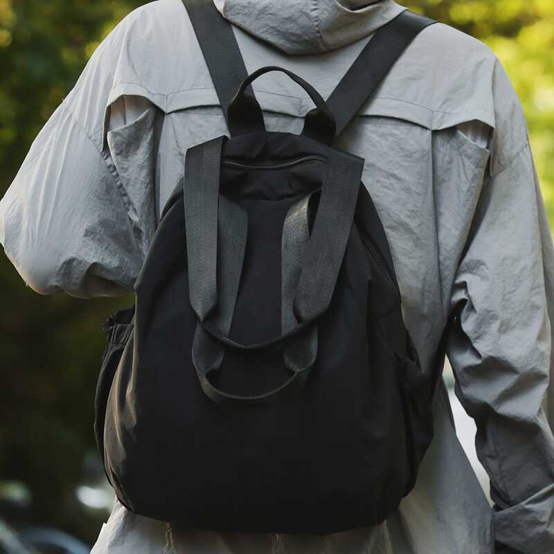 双肩包男小众设计贝壳包大容量轻便旅行背包防水多用手提单肩包女