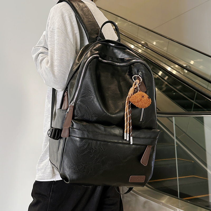 高级感PU皮双肩包男2025新款潮牌大容量旅行背包女大学生电脑书包