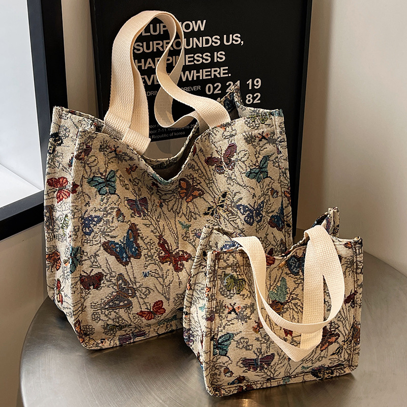 大容量通勤托特包包女2025帆布包女ins大学生上课时尚单肩手提包