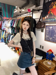 aaaaxbbb 大都会博物馆 牛仔短裙高腰A字裙遮肉复古水洗蓝半身裙