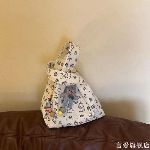 温柔奶白底卡通动物手提包可爱