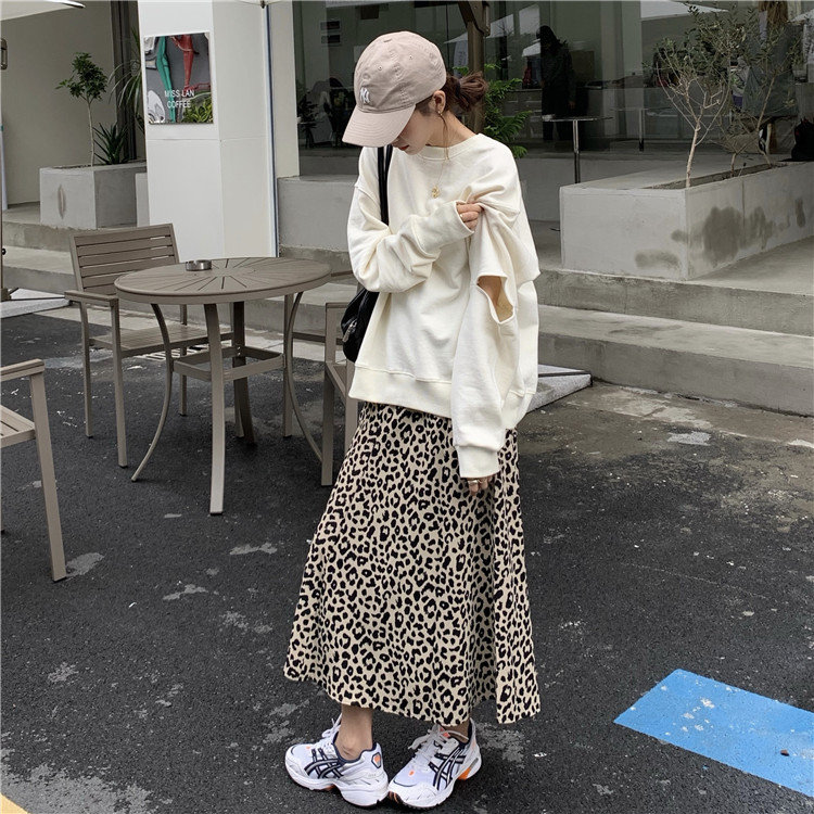 Real price autumn and winter new loose and thin hollowed out Sweater Top + Leopard Print Skirt Set