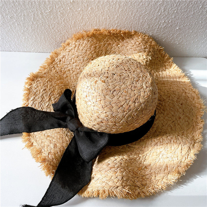 2022年大蝴蝶结拉菲草帽子女圆顶沙滩出游夏季遮阳帽手工大檐防晒