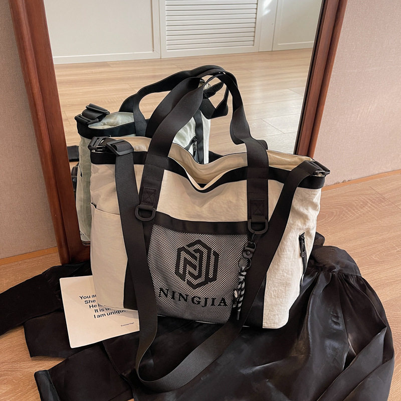 新款大容量手提健身包时尚收纳包旅游轻便旅行包短途出差行李袋潮
