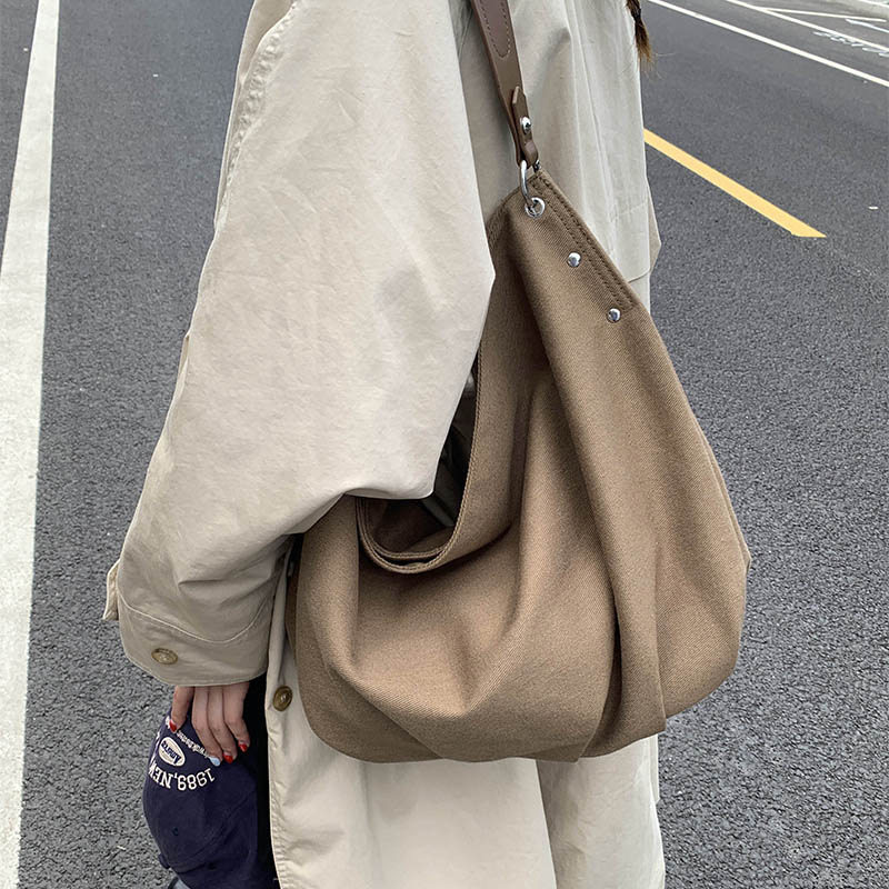 休闲通勤大容量帆布包包女新款轻便百搭斜挎包软面单肩托特包
