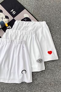 216-K54-P25 21春夏 中性 情侣屁帘叠穿打底绣花下摆松紧半身裙图片