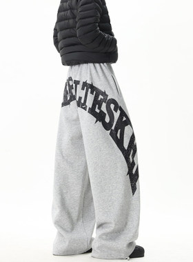 复古字母印花弯刀裤男