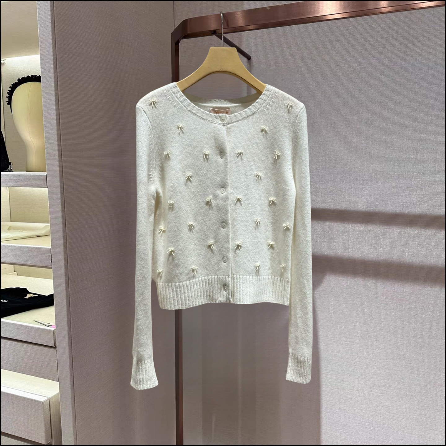 卓雅珠花蝴蝶结单排扣针织开衫女