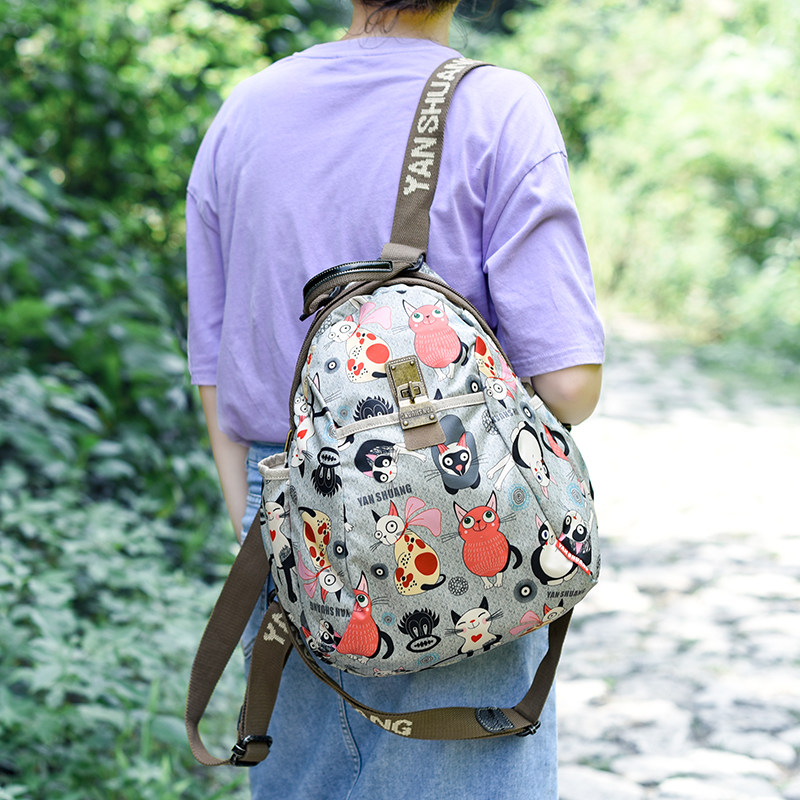 阎双中号双肩包2025新款女旅游包时尚猫猫布包大容量背包轻便斜挎
