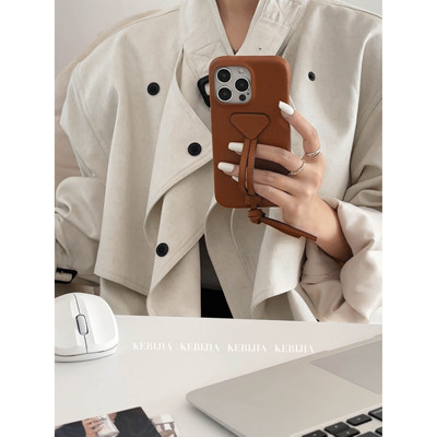 ins小众高级腕带设计皮质防摔适用于苹果17promax16/15/14手机壳