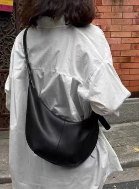 包包女式2025新款高级感小众通勤饺子包百搭大容量黑色软皮斜挎包