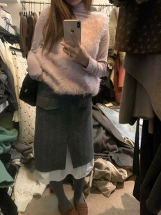 韩系25冬新款宽松显瘦百搭纯色双口袋设计感拼接开叉羊毛半身裙女
