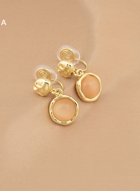 精致个性简约橙色猫眼石耳钉轻奢时尚气质高级感无耳洞蚊香盘耳夹