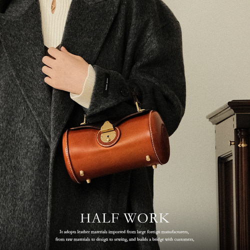 头层牛皮圆筒包女斜挎真皮