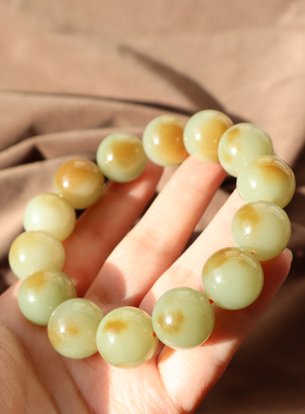 新疆且末黄口带糖聚宝盆16mm手串