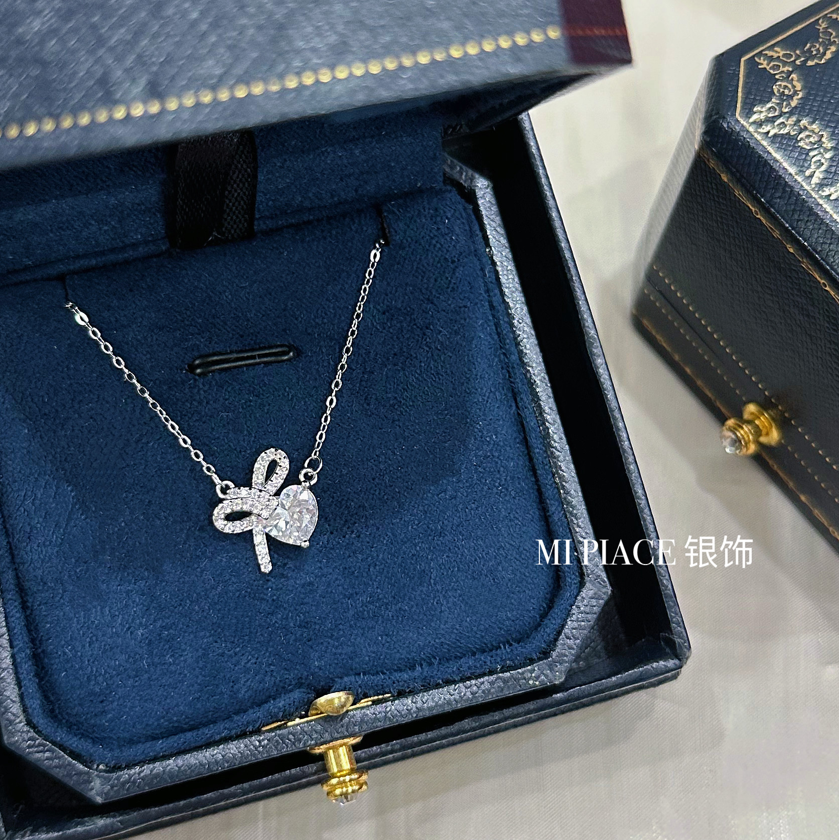 s999纯银爱心蝴蝶结项链女轻奢小众设计感锁骨链送女友情人节礼物