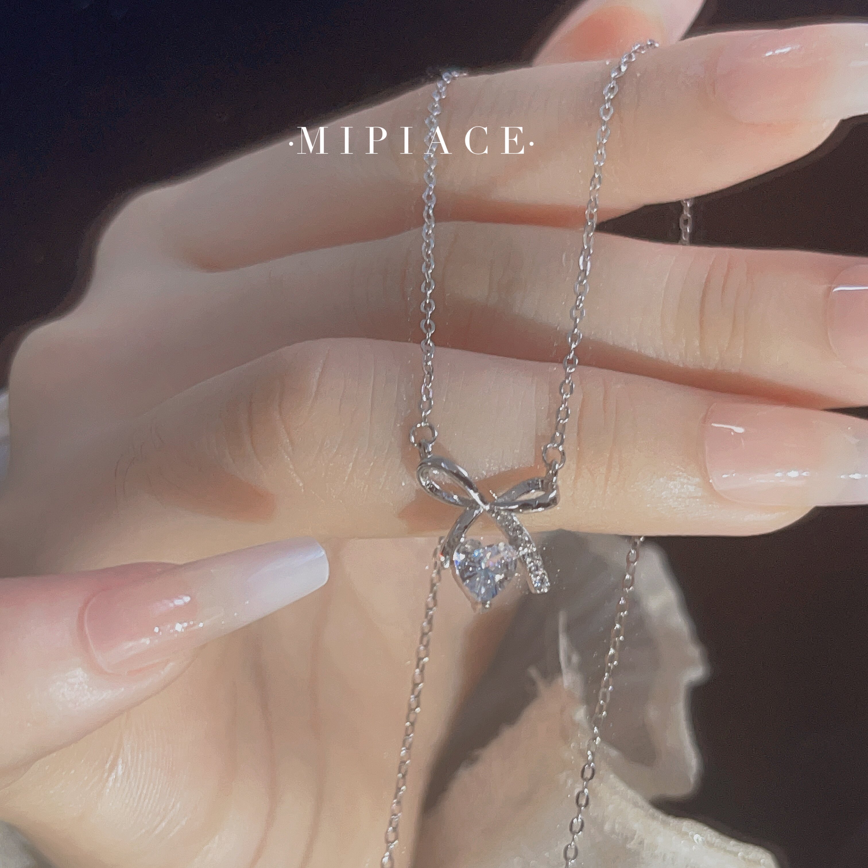 s999纯银蝴蝶结项链女轻奢小众设计爱心锆石吊坠送女友生日礼物