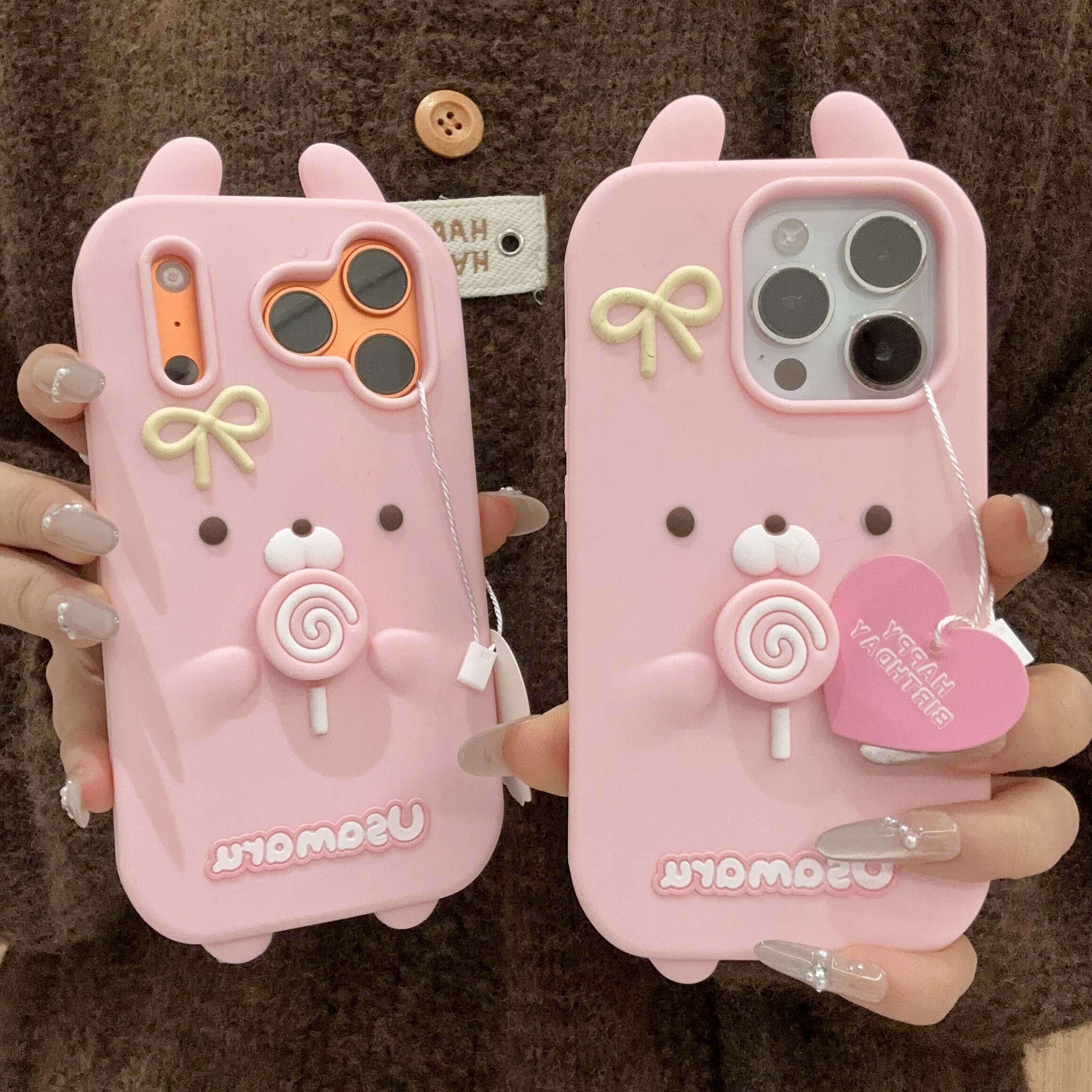 旋转棒棒糖兔丸耳朵适用于苹果17promax硅胶手机壳iPhone16pro韩风女款15pro小众创意14pro全包防摔13pro软套