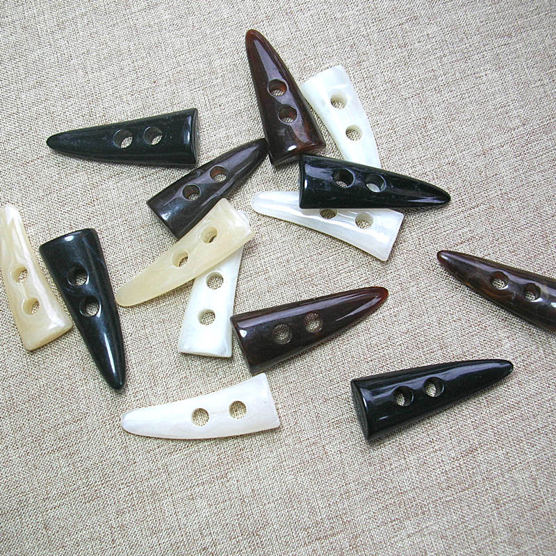 服装辅料 树脂牛角扣 大衣衣服纽扣毛衣长款风衣儿童牛角对扣