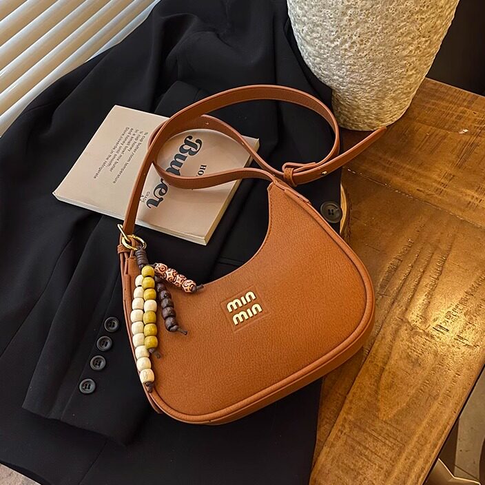 棕色月牙包女2026新款高级感手提单肩斜挎饺子包红色婚包腋下包包