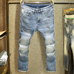 高端欧货蓝色牛仔裤男小脚修身弹力长裤潮流帅气百搭休闲男士裤子