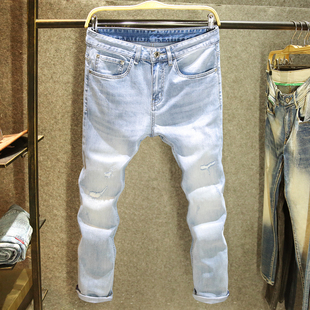 夏季薄款浅蓝色破洞牛仔裤男款修身小脚裤潮牌猫须百搭时尚裤子男