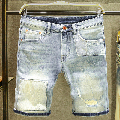 夏季牛仔短裤男潮牌拼接破洞裤子