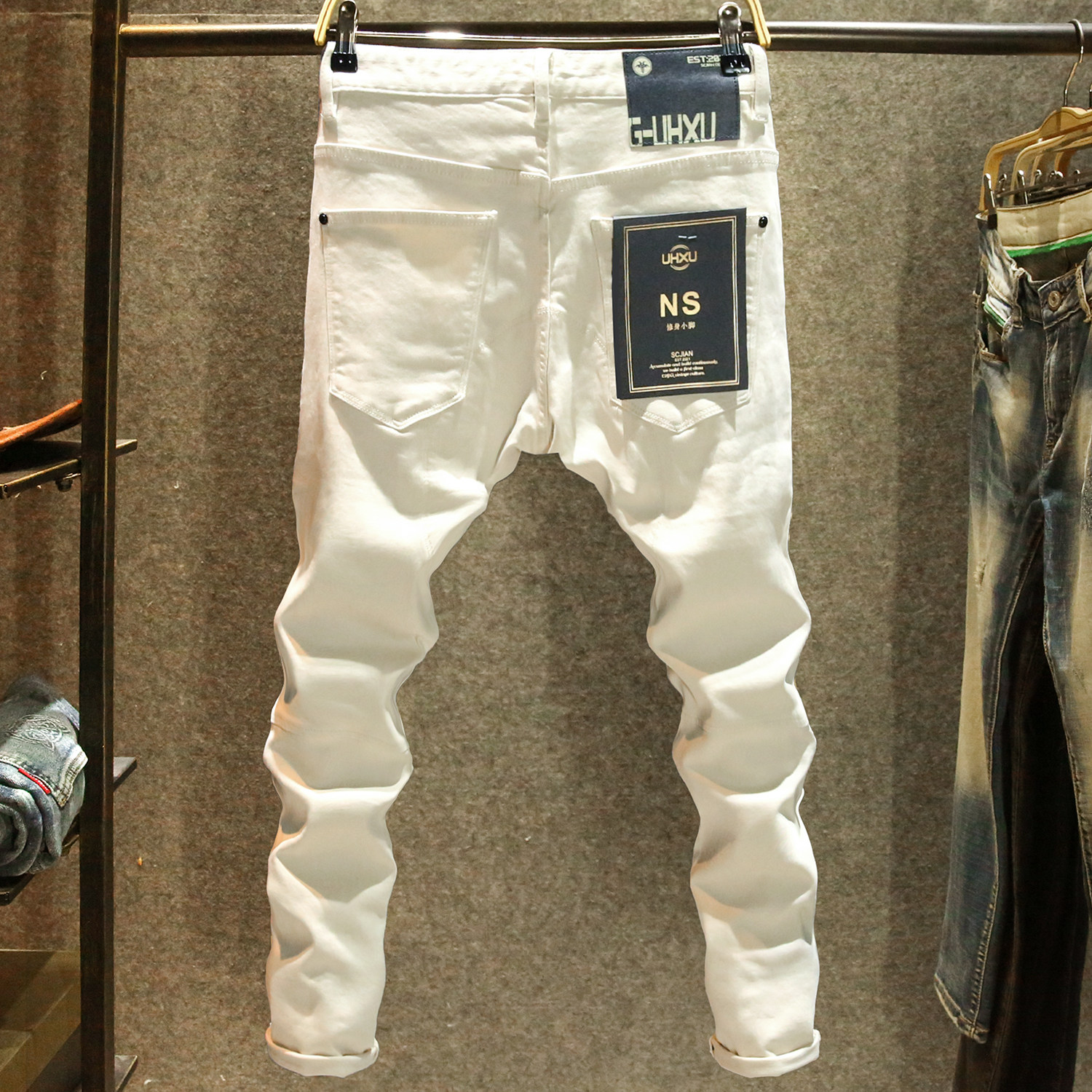 高端机车白色牛仔裤男款修身弹力小脚裤秋冬厚款潮牌拼接机能长裤