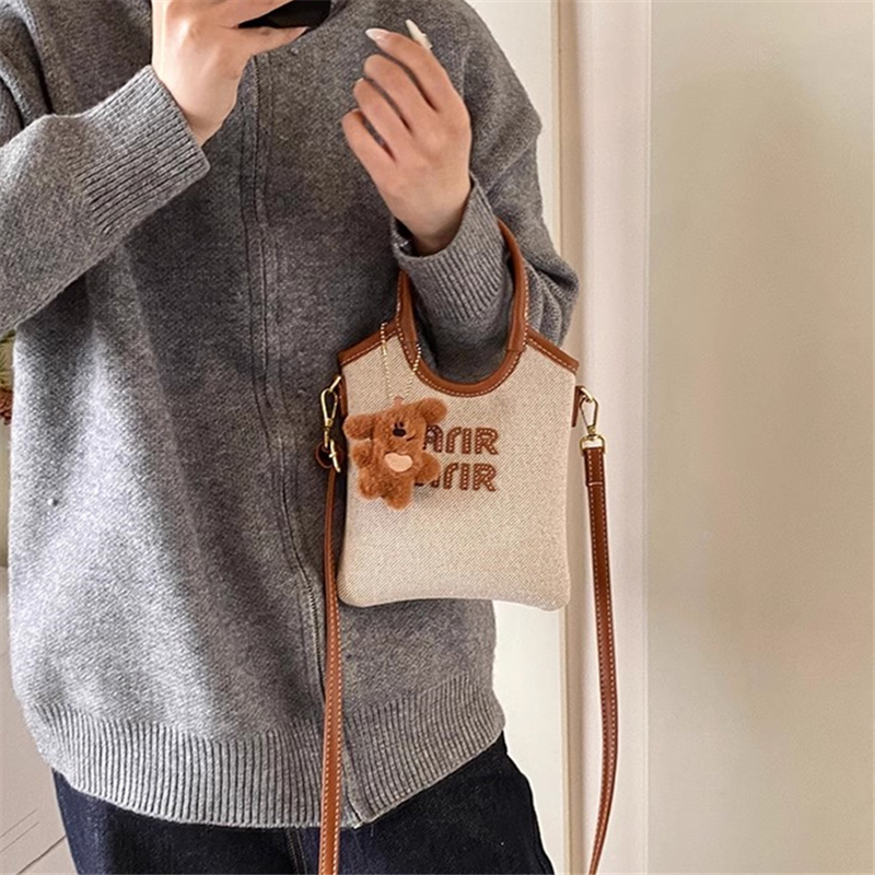 法式复古草编包大容量水桶包