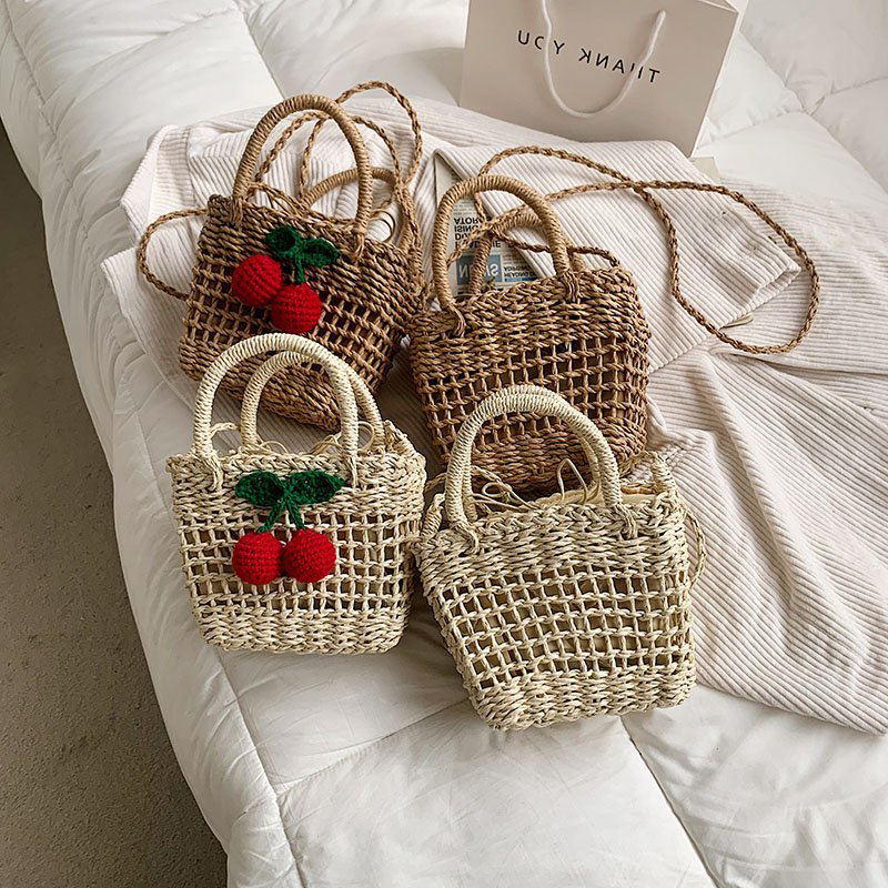 ins镂空樱桃手提包藤海边度假夏