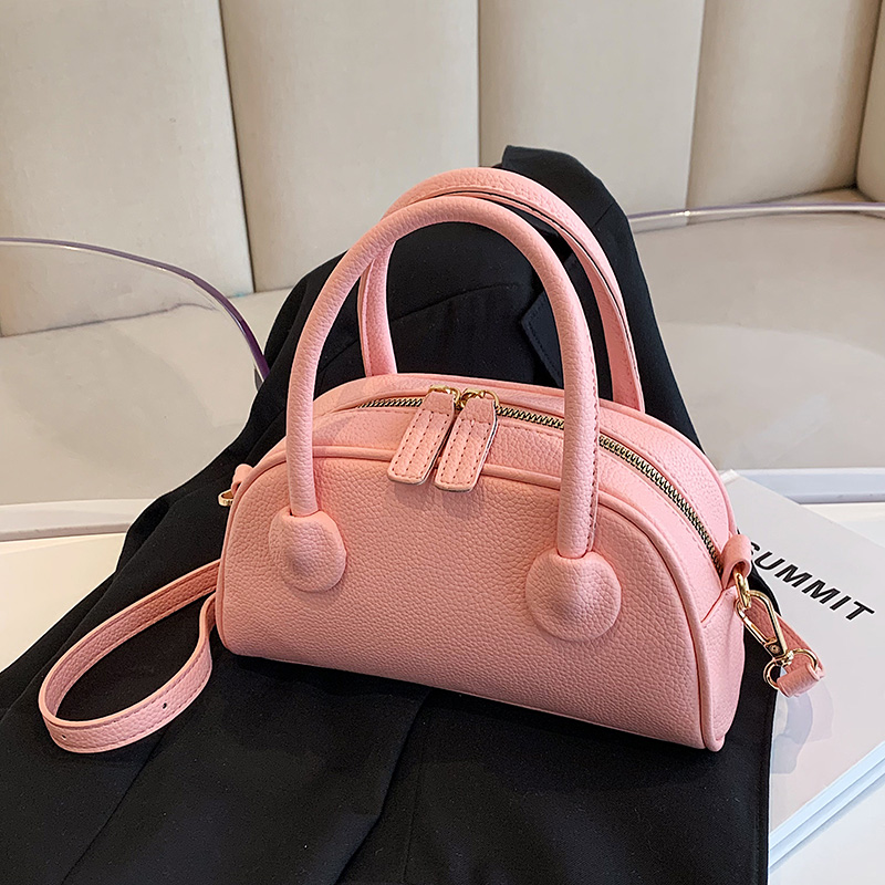 粉色贝壳包小众设计手提包