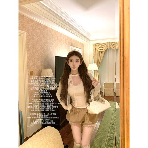 迟伞伞波点系带长袖打底衫